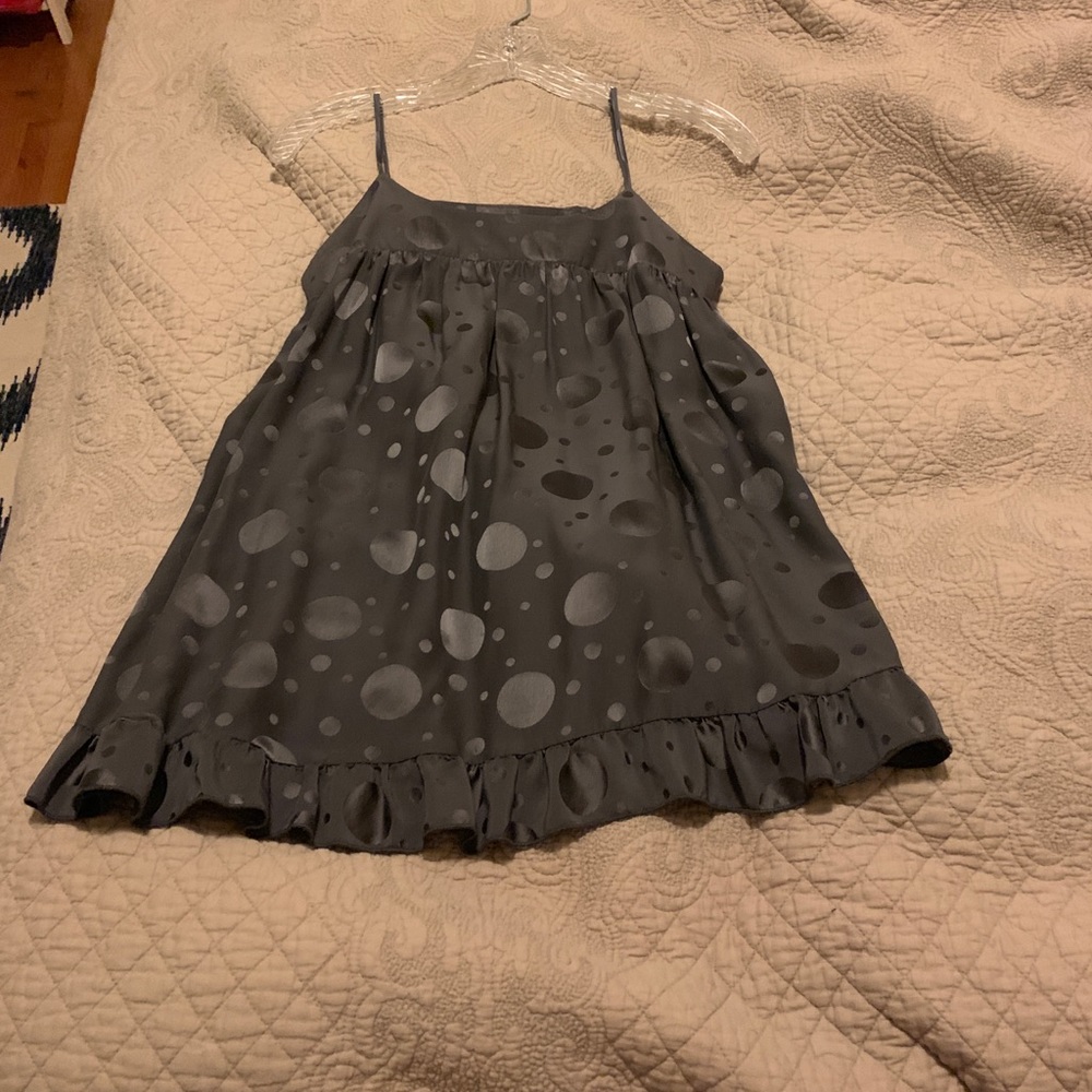 Open back grey silk blouse with ruffle finish